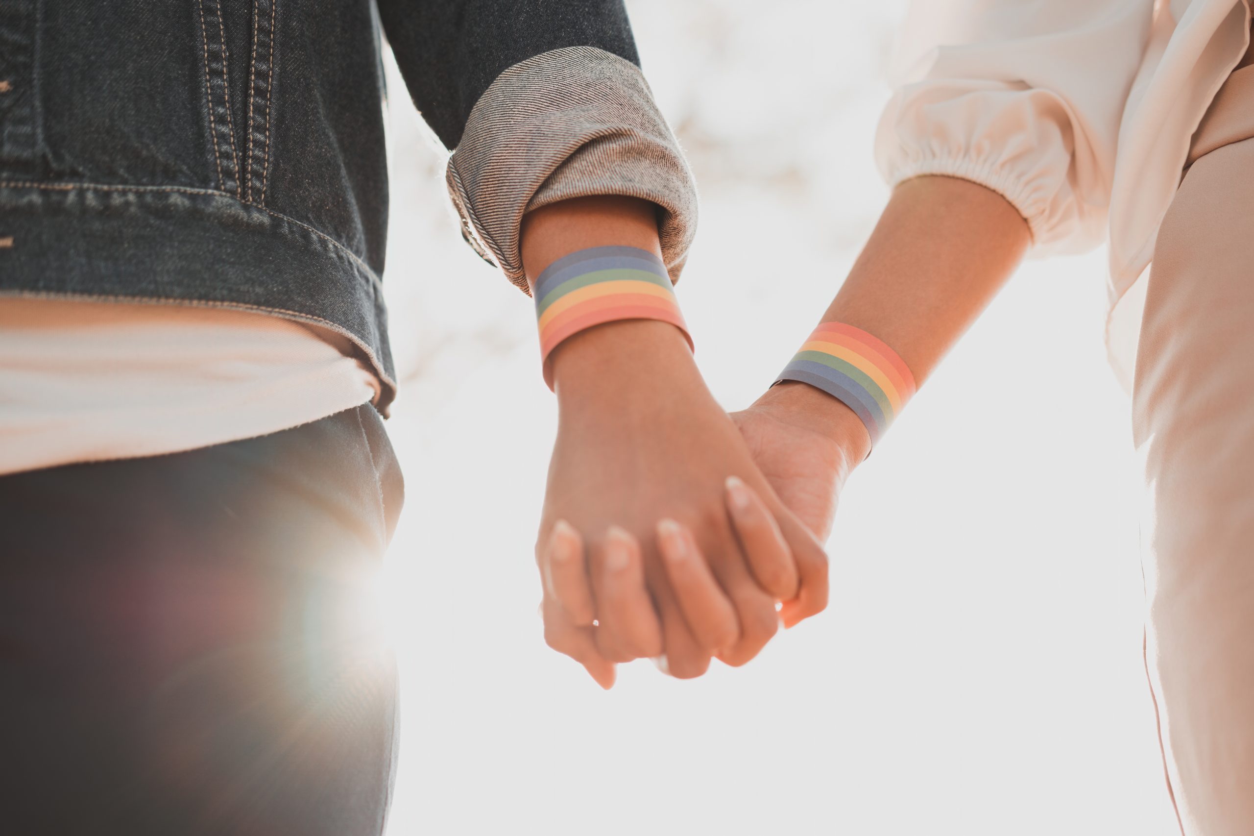 LGBTQ holding hands
